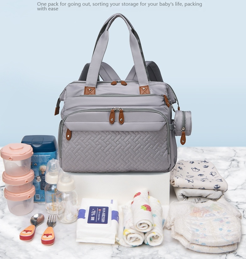 Mamigo  Multifunctional large mommy bag for outdoor use. 【Portable waterproof diaper pad included】Features baby changing mat and wet & dry separation design, ideal as a practical maternity hospital bag for new moms.