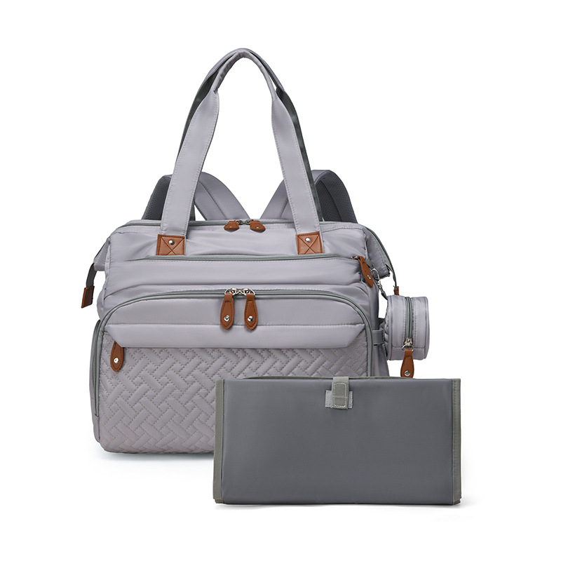 Mamigo  Multifunctional large mommy bag for outdoor use. 【Portable waterproof diaper pad included】Features baby changing mat and wet & dry separation design, ideal as a practical maternity hospital bag for new moms.