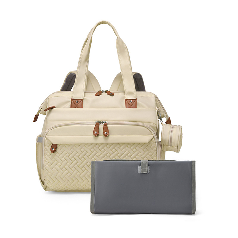 Mamigo  Multifunctional large mommy bag for outdoor use. 【Portable waterproof diaper pad included】Features baby changing mat and wet & dry separation design, ideal as a practical maternity hospital bag for new moms.